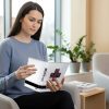 woman holding a small 3 ring binder.
